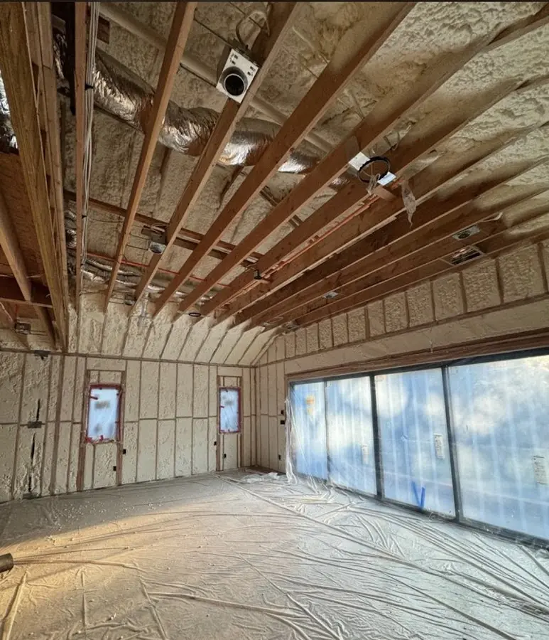 Interior walls and ceiling insulated with spray foam during new construction in Buckley